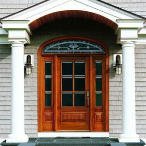 Large triple-pane home entry-way doors in what looks like maple wood | jakandb.com