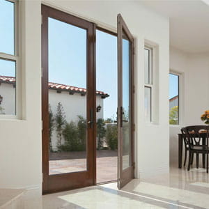 Full-length doors leading to the outside of the house by Andersen | jakandb.com