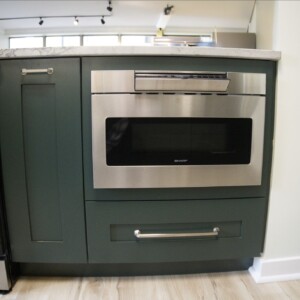 Bottle Green built-in microwave & spice pullout pantry