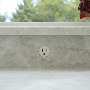 Round outlets for a flawless backsplash