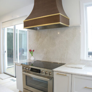 Oven between Pullout Utensil and Tray Divider