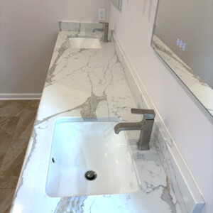 Quartz Countertop with Brushed Nickel Faucets